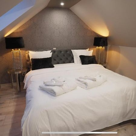 Les Suites M Wanze Exterior photo